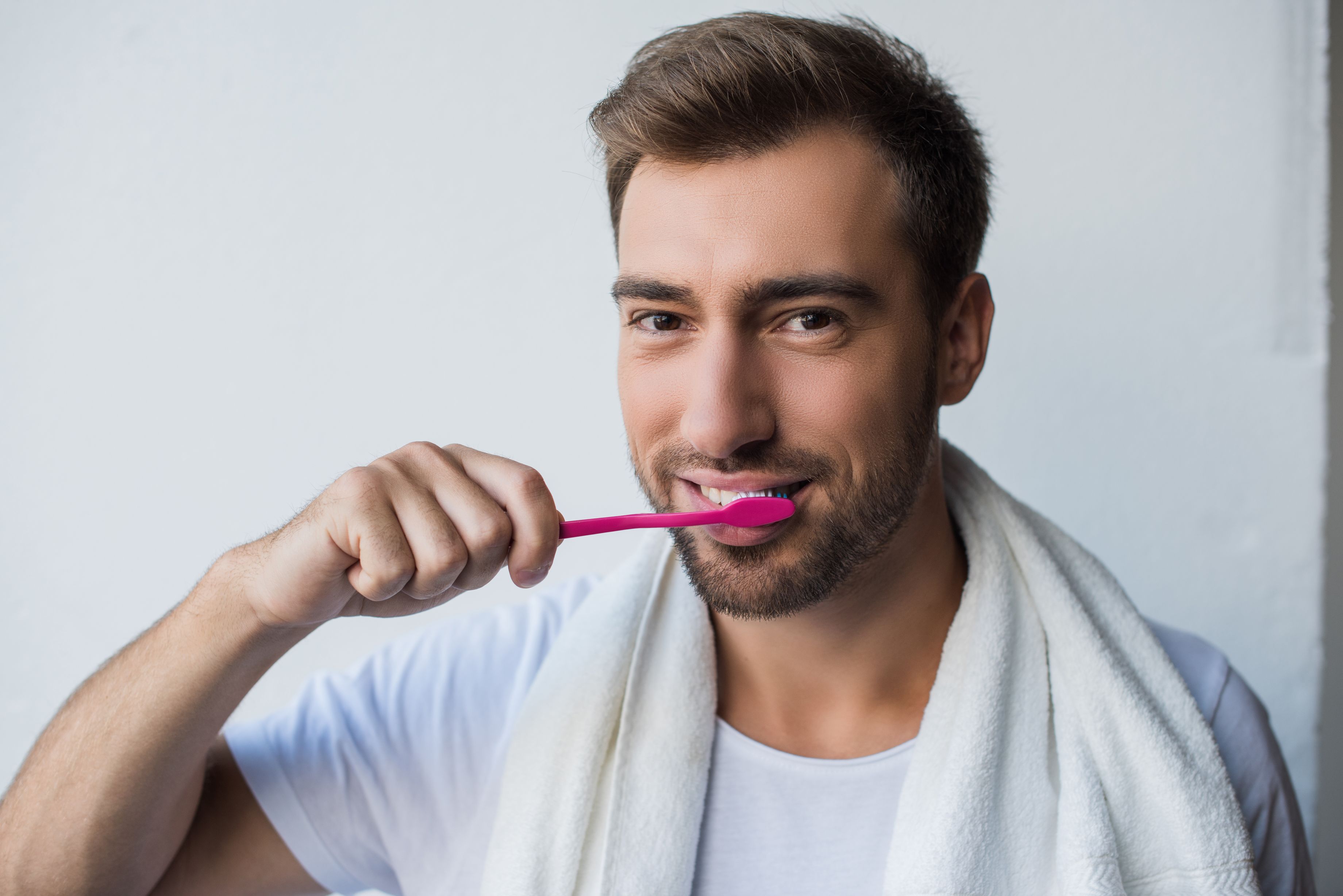 Man brushing teeth