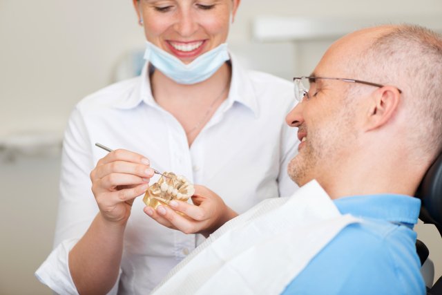 Doctor demonstrating implant