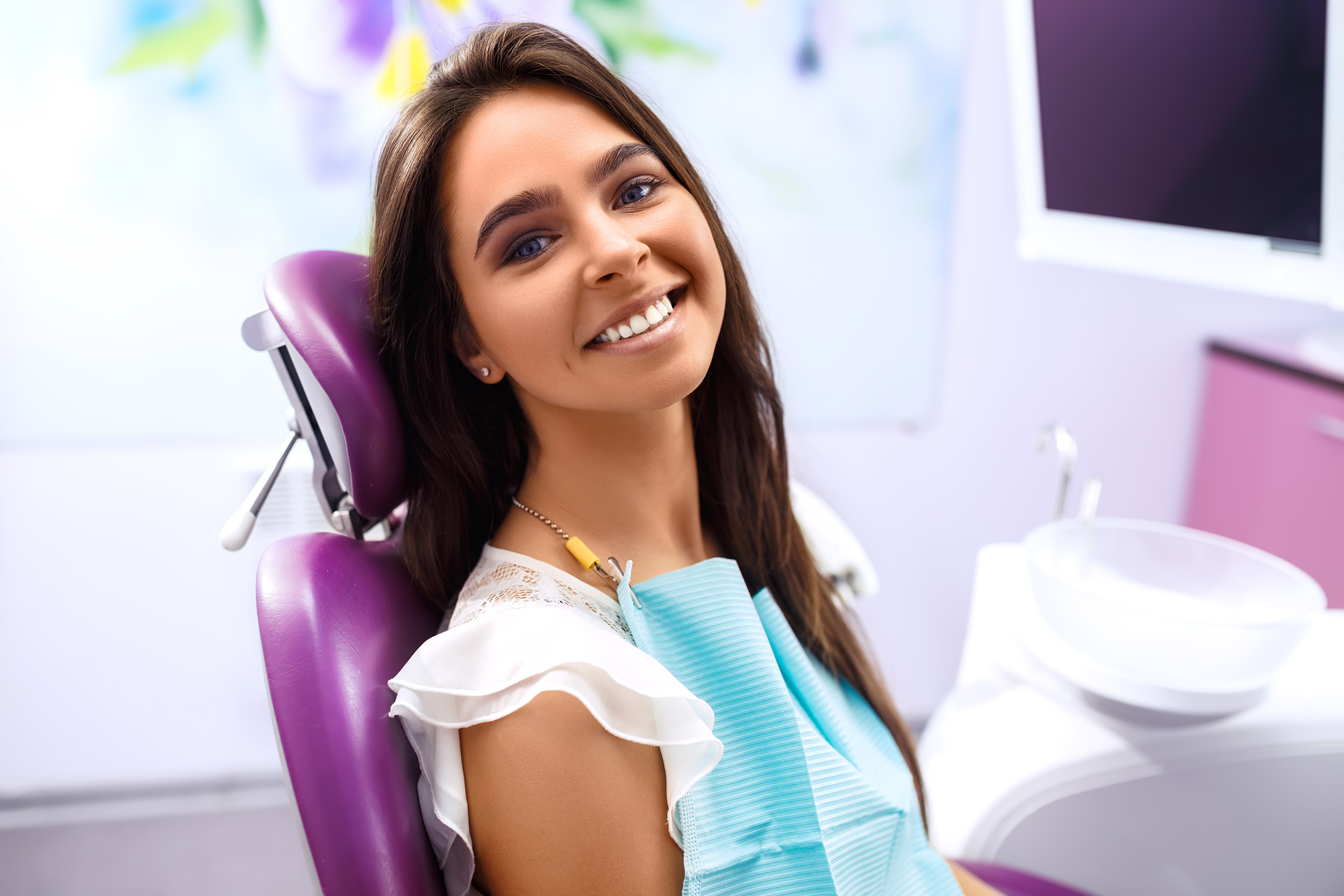 Girl smiling in dentist