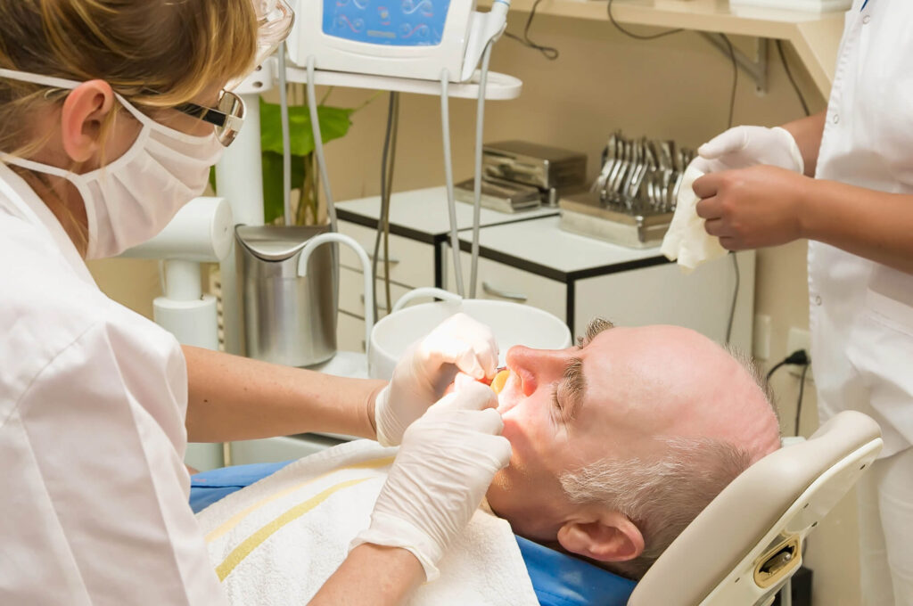 older-person-during-appointment-for-family-dentistry-Greenville-SC