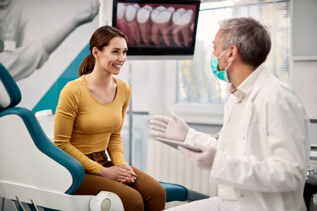 patient-with-dentist-after-looking-for-root-canal-near-me